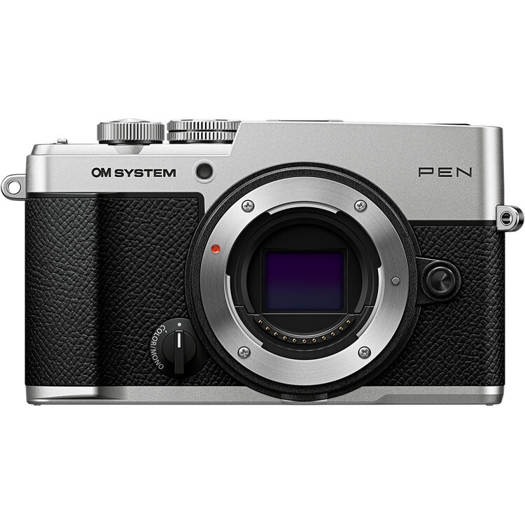 Front view of silver OM SYSTEM PEN mirrorless camera body without lens